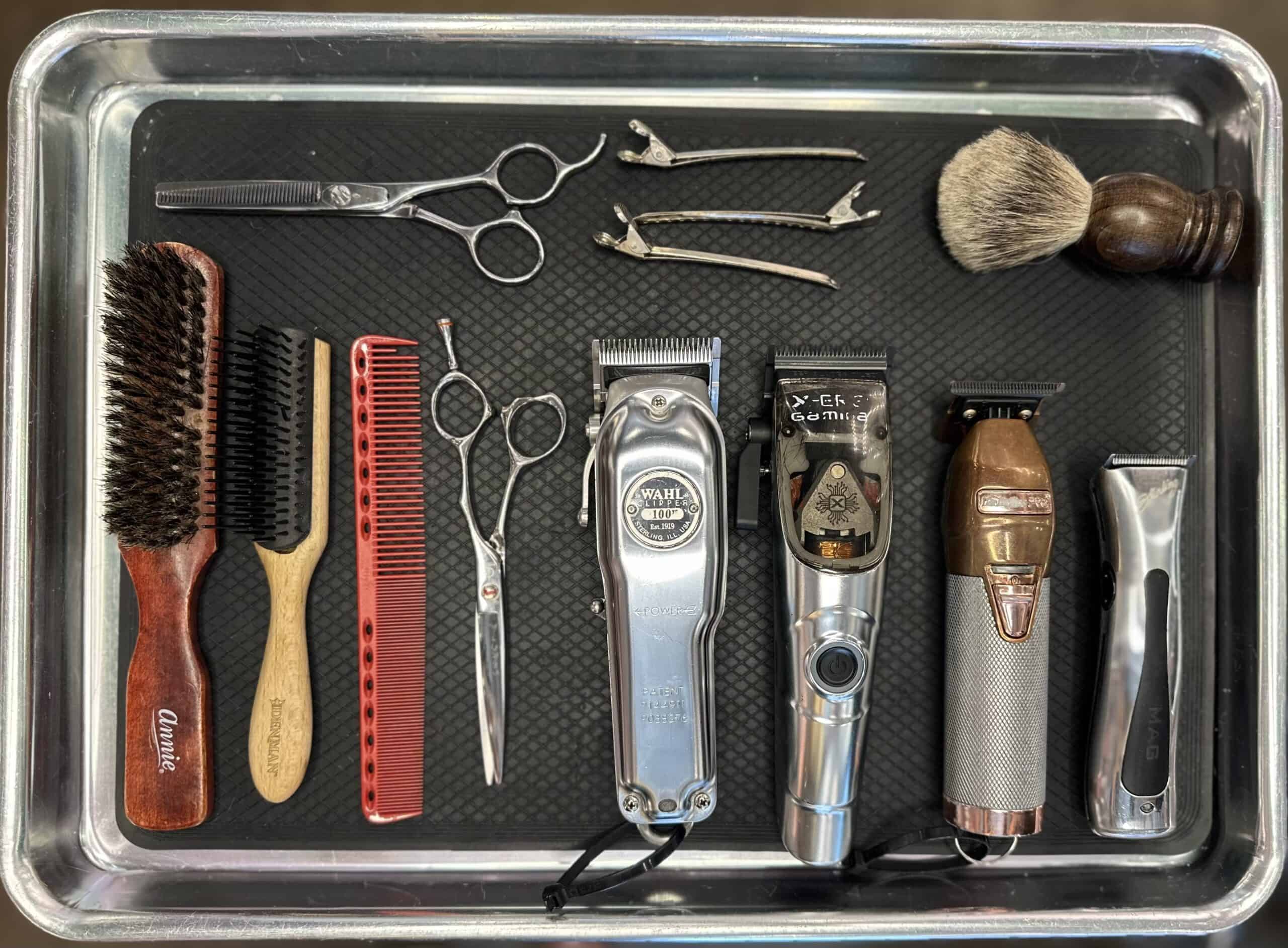 Men's Grooming tray with clippers, scissors and other salon tools